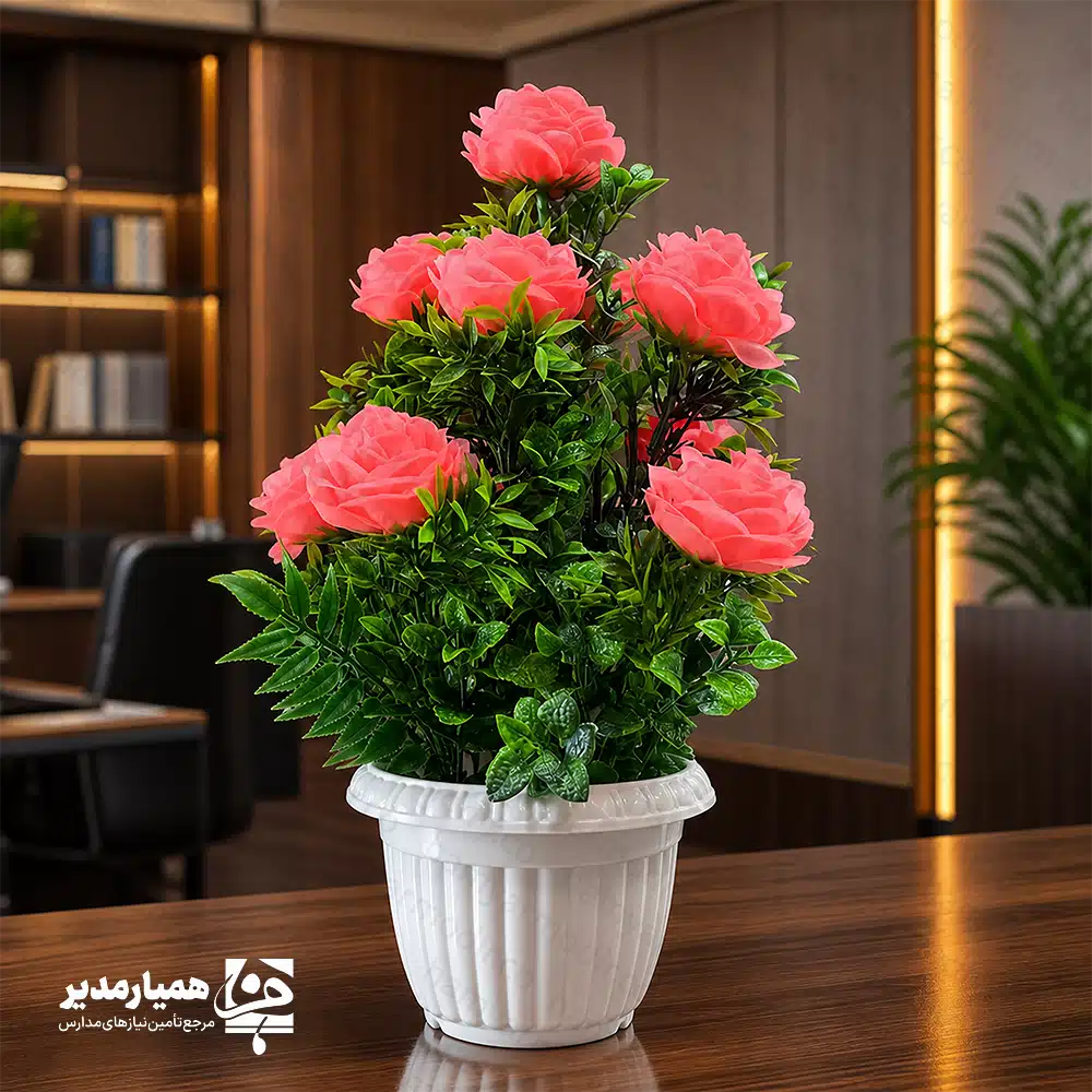 گلدان گل مصنوعی رومیزی طرح رز رنگی 🌹 گلدان رومیزی رز؛ طراوتِ ماندگار برای دفترِ مدرسه مدیران و معاونان گرامی! برای آوردنِ حسِ نشاط به دفترِ مدرسه یا اتاقِ معلمان، به دنبالِ المانی زیبا و بدونِ دغدغه هستید؟ این گلدانِ رومیزیِ رز، انتخابی عالی برای فضاسازیِ حرفهای است. ✨ گلهای مصنوعی، زیباییِ بینظیر را بدونِ نیاز به آبیاری یا رسیدگیِ روزانه به محیطِ کاریِ شما میآورند. رنگهایِ شادِ این محصول، انرژیِ مثبت را در جلساتِ رسمی و فضایِ آموزشی جاری میکند. 🌸 چرا گلدان رز، انتخابی هوشمندانه برای محیطِ اداری است؟ ✅ طراحیِ ظریف: الهامگرفته از گلِ رز برای ایجادِ فضایی صمیمی و درعینحال رسمی. 🌹 ✅ بدونِ دغدغه: برخلافِ گلهای طبیعی، نیازی به آبیاری یا نورِ خورشید ندارد. 💧 ✅ تأثیرِ بصری: رنگهایِ زنده و طراحیِ شیک، دفترِ شما را از یکنواختی خارج میکند. 🌿 ✅ هدیهای مناسب: گزینهای شیک برای تقدیر از همکاران یا تزیینِ میزِ جلسات. 🎁 کاربردهایِ پیشنهادی در فضایِ آموزشی: تزئینِ میزِ مدیریت و معاونت برای ایجادِ فضایی خوشایند. 🏢 زیباسازیِ اتاقِ مشاور و محیطهایِ استراحتِ معلمان. 📚 انتخابی مناسب برای ویترینهایِ اداری و پذیراییهایِ رسمی. ✨ اگر به دنبالِ دکوراسیونی شیک و کمدردسر هستید که همیشه تازه به نظر برسد، گلدانِ رز بهترین انتخاب برای میزِ شماست. 🧡